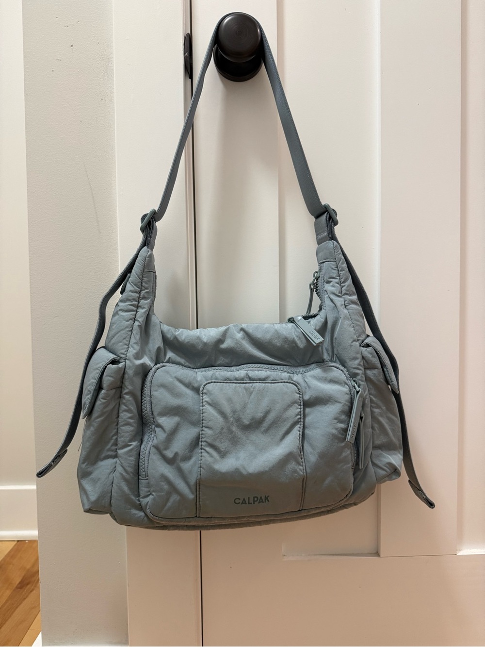 CALPAK cross body diaper bag